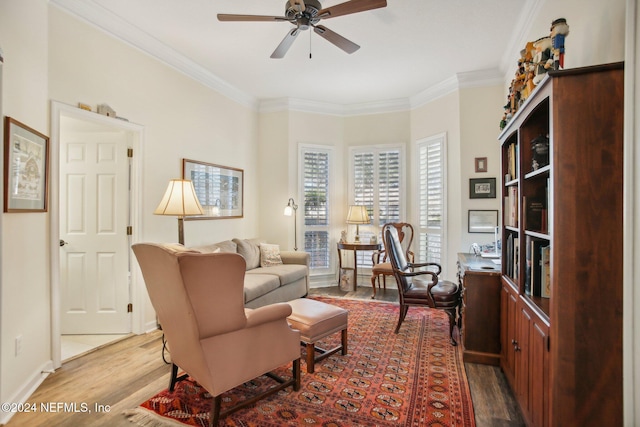 interior space featuring ceiling fan, hardwood / wood-style floors, and ornamental molding