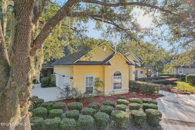 view of front of property featuring a garage