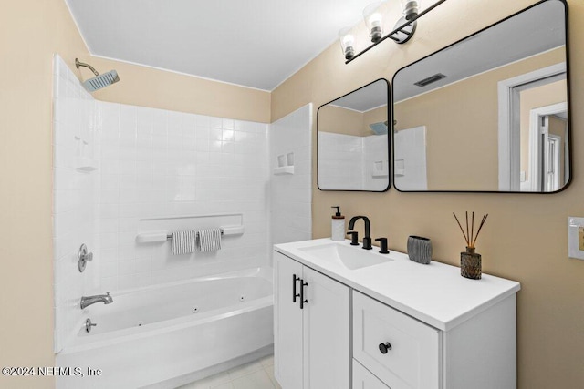 bathroom with vanity and  shower combination