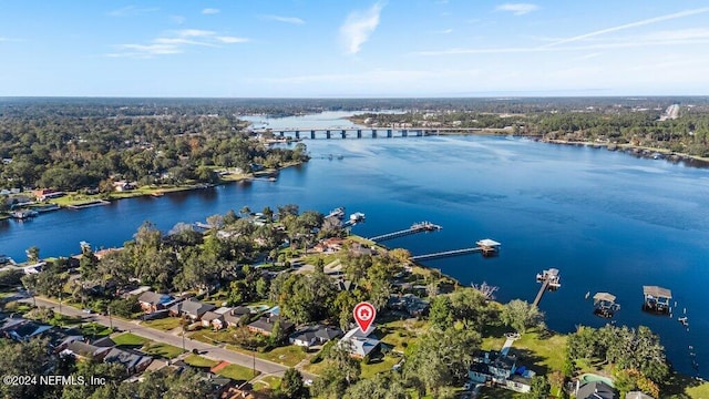 birds eye view of property featuring a water view