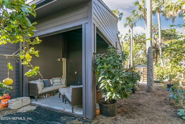 exterior space with outdoor lounge area and a patio area