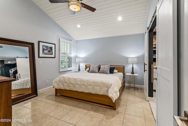 bedroom featuring ceiling fan, light tile patterned floors, wood ceiling, and lofted ceiling