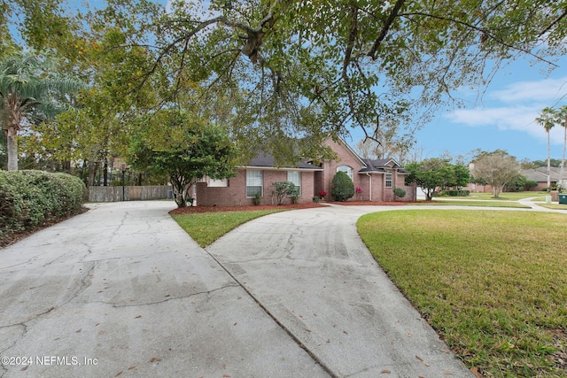 view of front of home with a front lawn