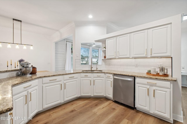 kitchen with white cabinetry, sink, stainless steel dishwasher, and decorative light fixtures