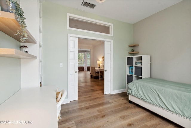 bedroom featuring light wood-type flooring