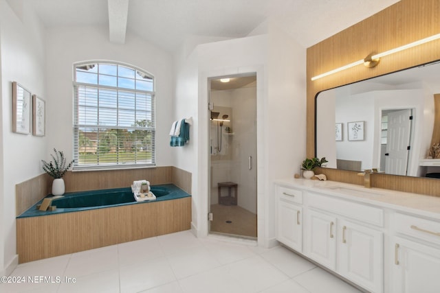 bathroom featuring separate shower and tub, vaulted ceiling with beams, tile patterned floors, and vanity