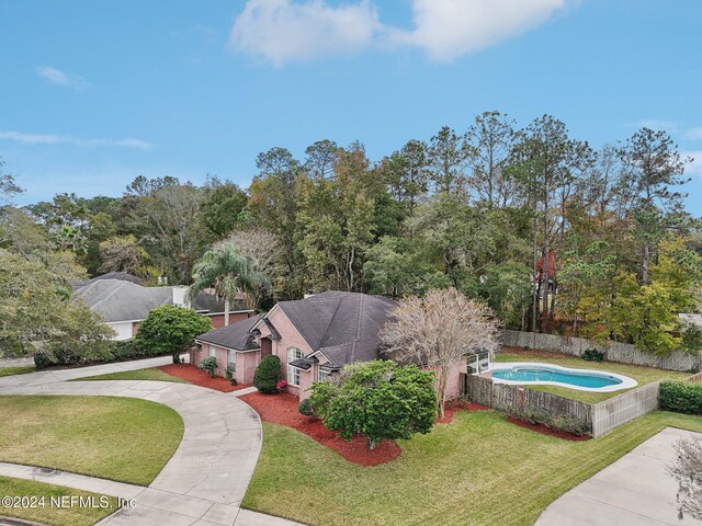 exterior space with a yard