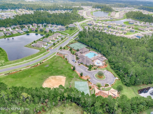 drone / aerial view with a water view