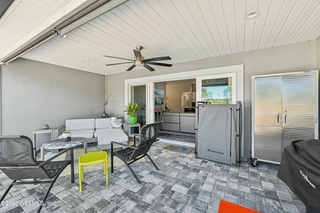 view of patio / terrace with a ceiling fan, grilling area, and an outdoor hangout area