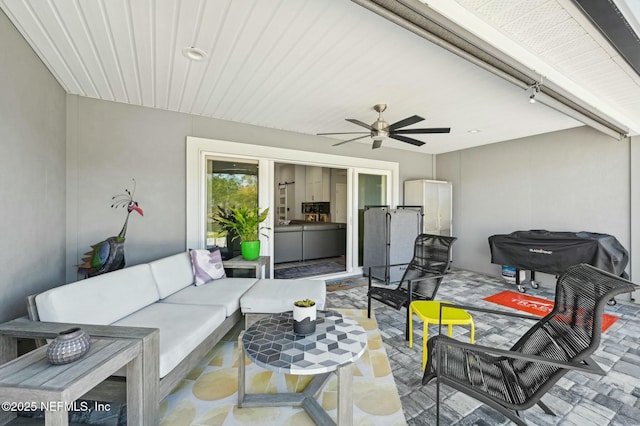 view of patio / terrace featuring a ceiling fan and outdoor lounge area