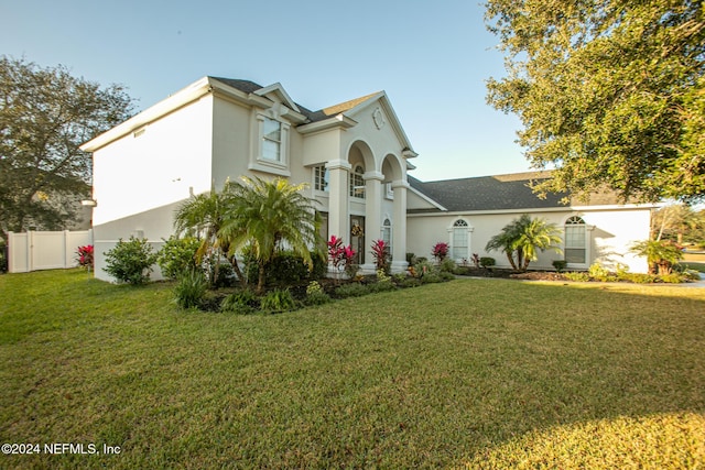 view of front of house with a front lawn