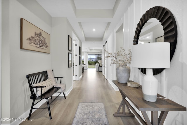 corridor featuring light hardwood / wood-style floors