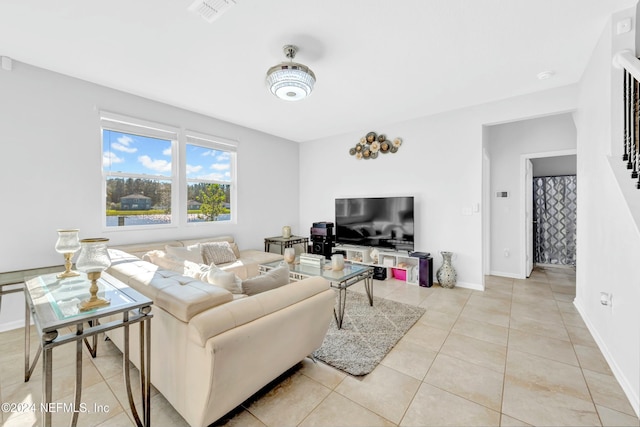 living room featuring light tile patterned flooring