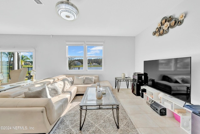 living room with light tile patterned floors