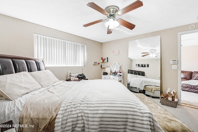 bedroom with carpet and ceiling fan