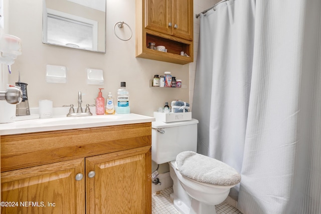 bathroom with tile patterned flooring, vanity, curtained shower, and toilet