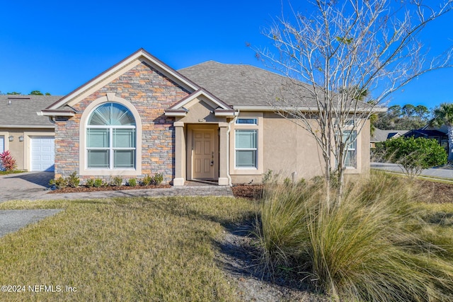 view of front of house with a garage