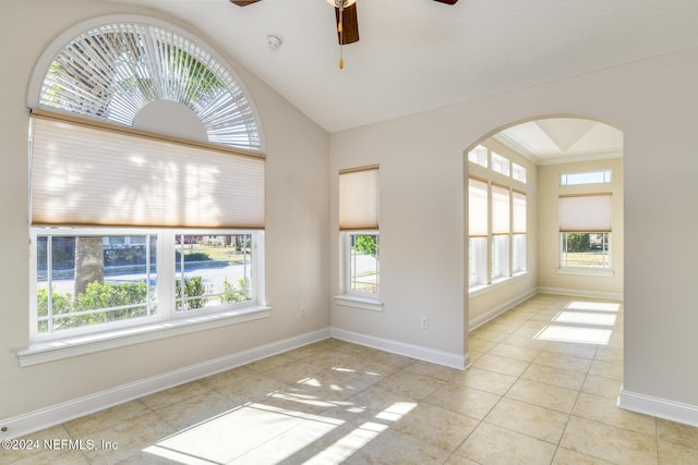 unfurnished room featuring ceiling fan and light tile patterned floors