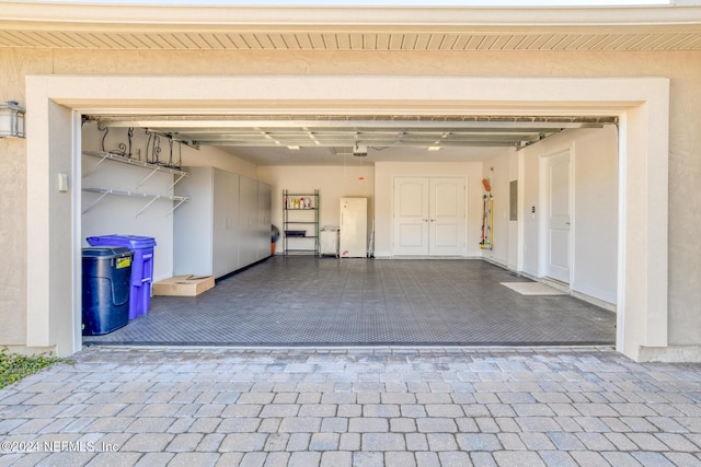 garage featuring a garage door opener