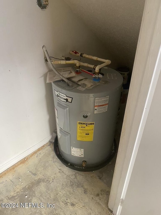 utility room with water heater