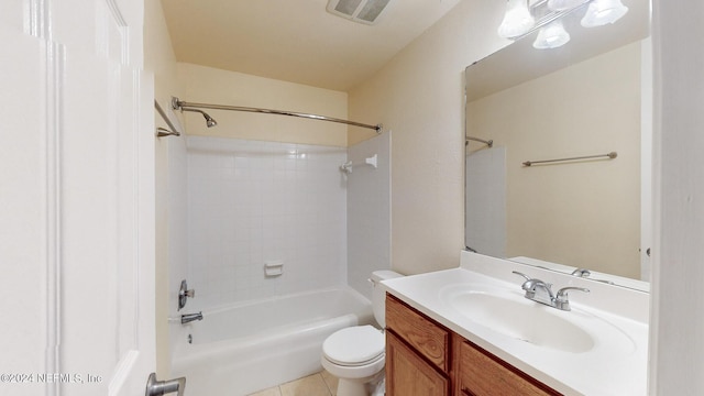 full bathroom with toilet, vanity, tile patterned floors, and tiled shower / bath combo