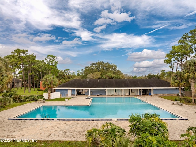 view of pool featuring a patio area