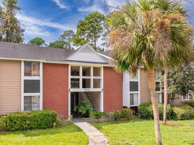 8880 Old Kings Rd S Unit 106, Jacksonville, FL 32257 - view of building exterior featuring stairs