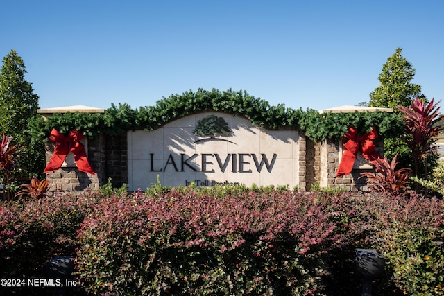 view of community sign