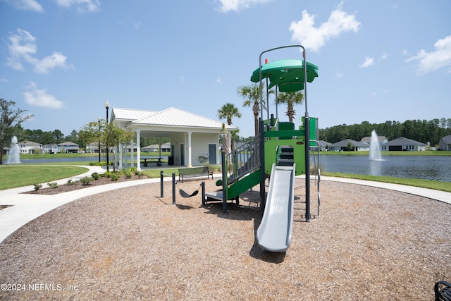 view of jungle gym with a gazebo and a water view