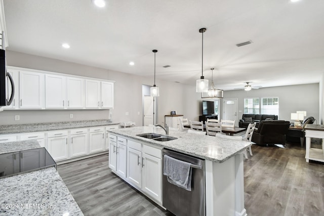 kitchen featuring sink, stainless steel dishwasher, ceiling fan, decorative light fixtures, and white cabinetry