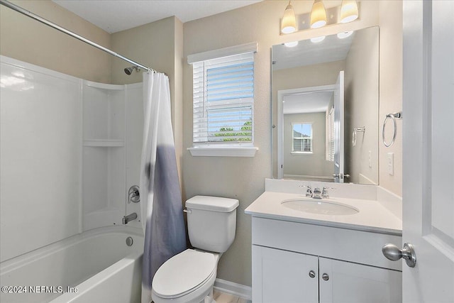 full bathroom featuring vanity, toilet, and shower / bathtub combination with curtain