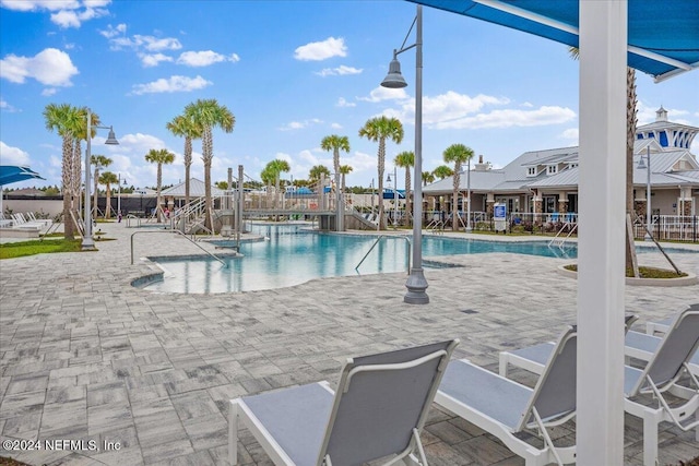 view of swimming pool featuring a patio area