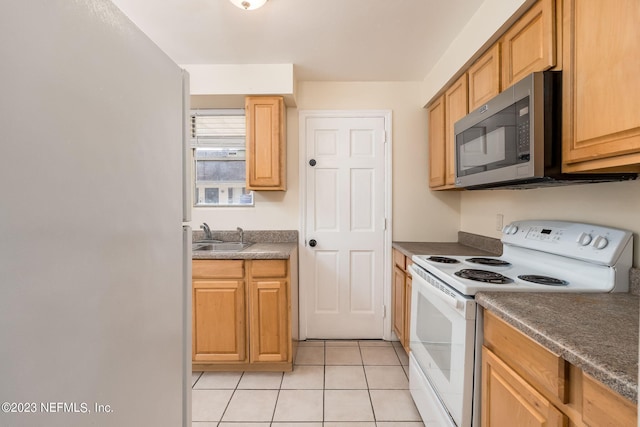 kitchen featuring light tile patterned floors, white electric stove, and sink