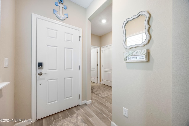 foyer entrance featuring light wood-type flooring