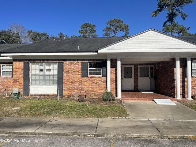 view of front of home featuring covered porch