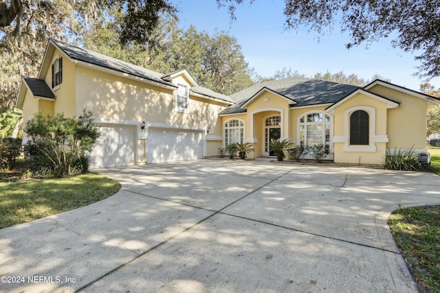 view of front of house with a garage