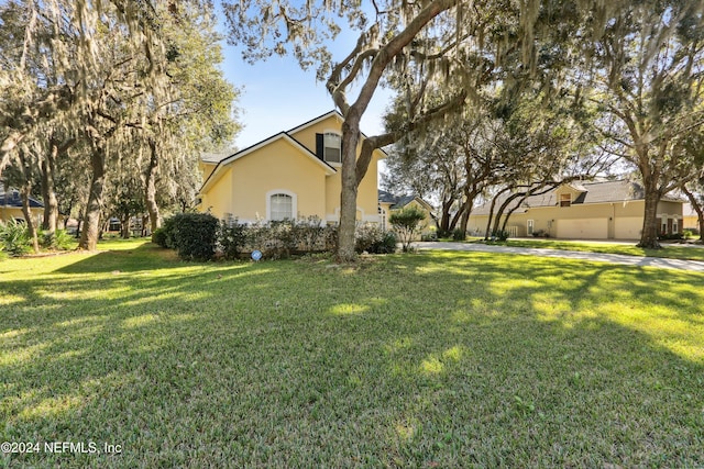 exterior space with a front yard