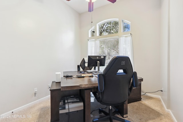 office area featuring carpet floors and ceiling fan