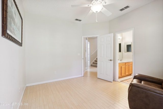 interior space with light hardwood / wood-style floors and ceiling fan