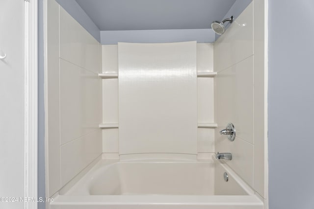 bathroom with shower / tub combination