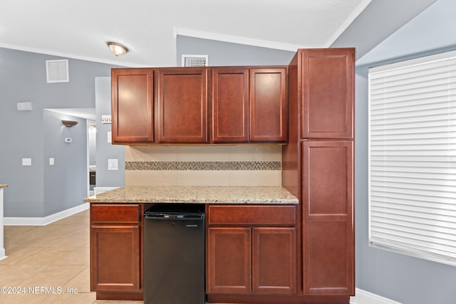 kitchen featuring lofted ceiling, ornamental molding, light tile patterned floors, tasteful backsplash, and light stone counters