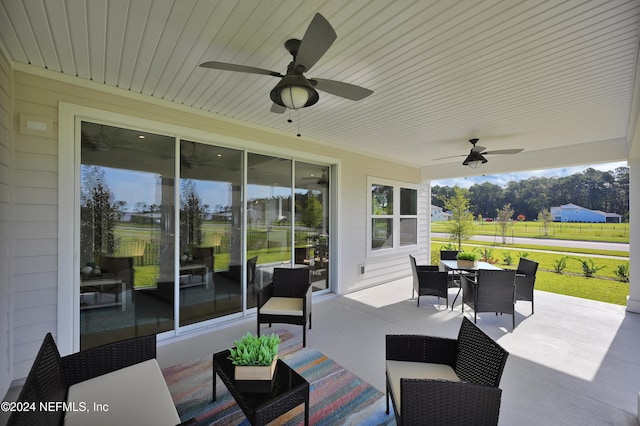 1024 Creighton Rd, Fleming Island, FL 32003 - view of patio / terrace with a ceiling fan, an outdoor hangout area, and outdoor dining space