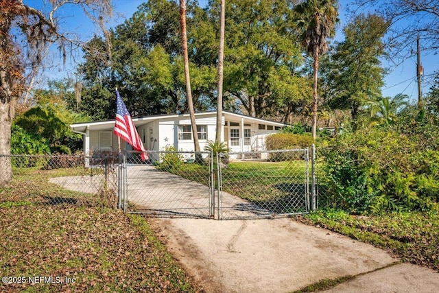 ranch-style home with a carport