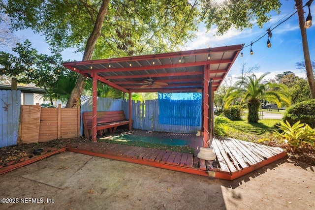 view of patio / terrace featuring a pergola, a wooden deck, and ceiling fan