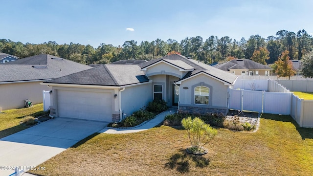 ranch-style house with a garage and a front lawn