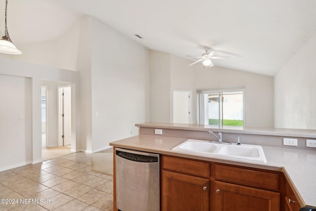 kitchen with dishwasher, sink, vaulted ceiling, light tile patterned floors, and decorative light fixtures