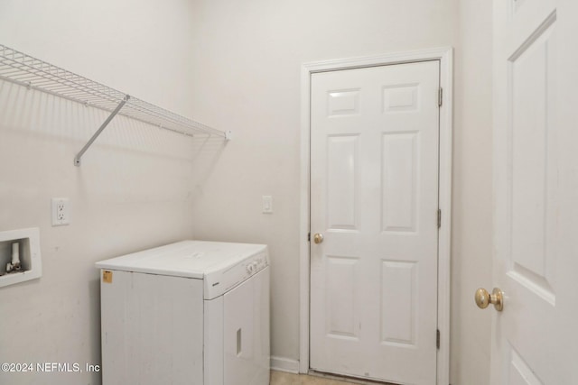 laundry area featuring washer / clothes dryer