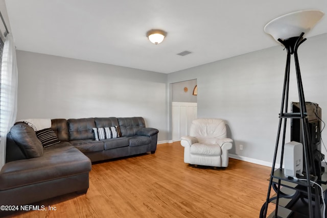 living room with hardwood / wood-style flooring