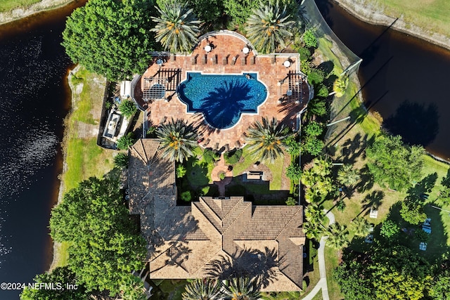 birds eye view of property featuring a water view