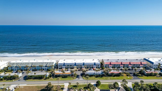 drone / aerial view with a view of the beach and a water view